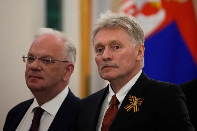 Kremlin spokesman Dmitry Peskov (R) and head of the Federal Service for Military-Technical Cooperation Dmitry Shugayev attend talks between Russian President and Serbia's President at the Kremlin in Moscow on May 9, 2025. (Photo by Alexander Zemlianichenko / POOL / AFP)