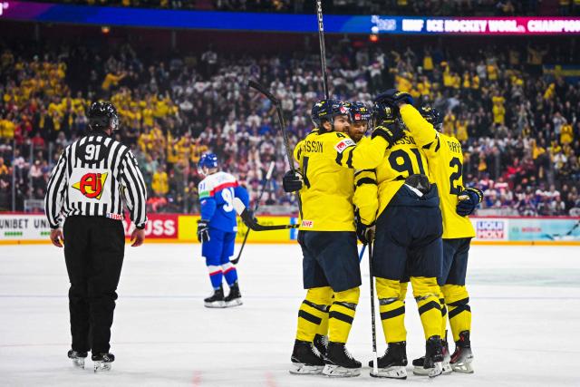 Sweden’s forward #91 Leo Carlsson celebrates with his teammates after scoring 2-0 during the IIHF Men's Ice Hockey World Championship match between Sweden and Slovakia in Stockholm, on May 9, 2025. (Photo by Jonathan NACKSTRAND / AFP)