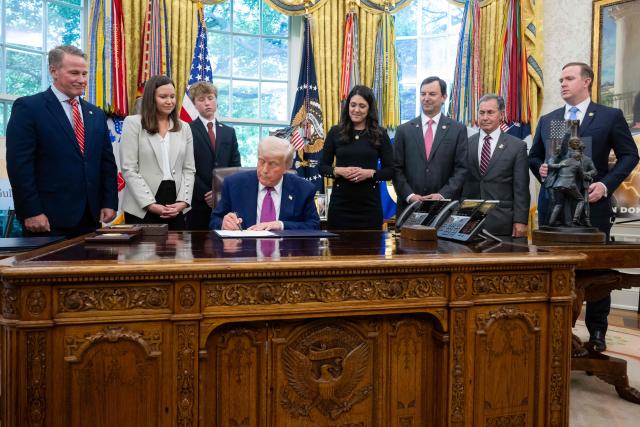 US President Donald Trump signs an executive order on legislation relating to household consumer energy policies, in the Oval Office of the White House in Washington, DC, on May 9, 2025. (Photo by SAUL LOEB / AFP)
