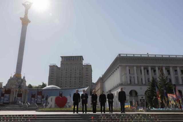 (From L) Poland's Prime Minister Donald Tusk, Britain's Prime Minister Keir Starmer, Olena Zelenska, Ukraine's President Volodymyr Zelensky, France's President Emmanuel Macron and Germany's Chancellor Friedrich Merz pose for a picture at the Independence Square (Maidan) in Kyiv on May 10, 2025, ahead of a gathering of European leaders in the Ukranian capital. The leaders of Britain, France, Germany and Poland make an unprecedented joint visit to Kyiv on May 10, 2025 for talks with Ukraine's President Volodymyr and to urge Russia to agree a ceasefire, a joint statement said. (Photo by Roman PILIPEY / AFP)