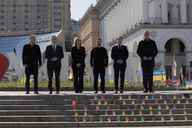 (From L) Poland's Prime Minister Donald Tusk, Britain's Prime Minister Keir Starmer, Olena Zelenska, Ukraine's President Volodymyr Zelensky, France's President Emmanuel Macron and Germany's Chancellor Friedrich Merz pose for a picture at the Independence Square (Maidan) in Kyiv on May 10, 2025, ahead of a gathering of European leaders in the Ukranian capital. The leaders of Britain, France, Germany and Poland make an unprecedented joint visit to Kyiv on May 10, 2025 for talks with Ukraine's President Volodymyr and to urge Russia to agree a ceasefire, a joint statement said. (Photo by Roman PILIPEY / AFP)