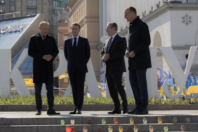 (From L) Poland's Prime Minister Donald Tusk, France's President Emmanuel Macron, Britain's Prime Minister Keir Starmer and Germany's Chancellor Friedrich Merz visit the Independence Square (Maidan) in Kyiv on May 10, 2025, ahead of a gathering of European leaders in the Ukranian capital. The leaders of Britain, France, Germany and Poland make an unprecedented joint visit to Kyiv on May 10, 2025 for talks with Ukraine's President Volodymyr and to urge Russia to agree a ceasefire, a joint statement said. (Photo by Roman PILIPEY / AFP)