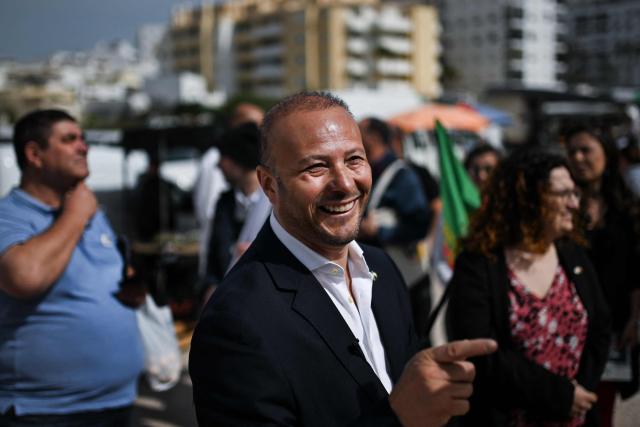 CHEGA far-right party's lawmaker for Algarve, Joao Paulo Graca smiles during a party’s electoral campaign action at Quarteira market in Algarve on April 9, 2025. Snap legislative vote take place in Portugal on May 18, the third national election in three years. In Portugal's tourist-friendly south, the far right is gaining ground. Chega (Enough!) came first in the Algarve province in the last poll, with 27.2 percent of the vote. (Photo by PATRICIA DE MELO MOREIRA / AFP)