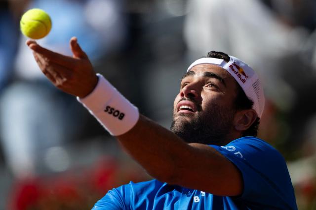 Italy’s Matteo Berrettini serves to Britain’s Jacob Fearnley during the men's singles match at the ATP Rome Open tennis tournament at Foro Italico in Rome on May 10, 2025.  (Photo by MARCO BERTORELLO / AFP)