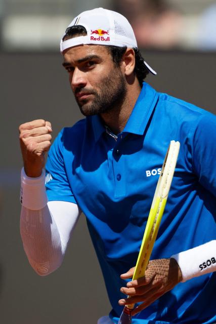 Italy’s Matteo Berrettini reacts after a point as he plays against Britain’s Jacob Fearnley during the men's singles match at the ATP Rome Open tennis tournament at Foro Italico in Rome on May 10, 2025.  (Photo by MARCO BERTORELLO / AFP)