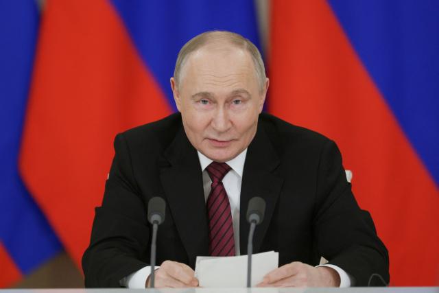 In this pool photograph distributed by Russian state agency Sputnik, Russia's President Vladimir Putin addresses the media following his meetings with foreign leaders in Moscow on May 11, 2025, during celebrations of the 80th anniversary of the Soviet Union's victory over Nazi Germany in World War II. (Photo by Gavriil GRIGOROV / POOL / AFP)