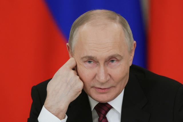 In this pool photograph distributed by Russian state agency Sputnik, Russia's President Vladimir Putin addresses the media following his meetings with foreign leaders in Moscow on May 11, 2025, during celebrations of the 80th anniversary of the Soviet Union's victory over Nazi Germany in World War II. (Photo by Gavriil GRIGOROV / POOL / AFP)
