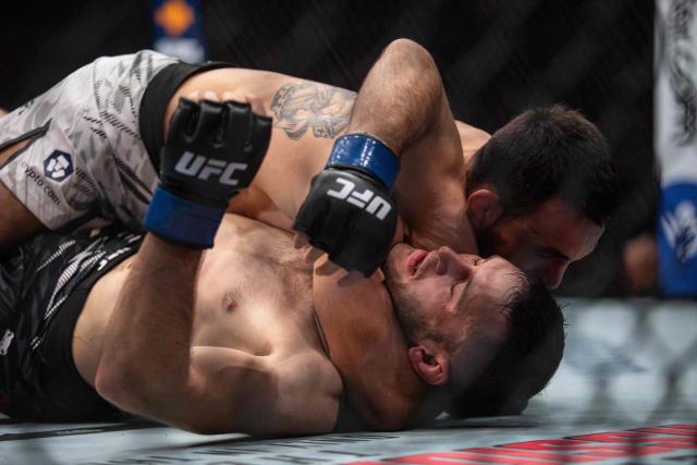 French mixed martial artist Benoit Saint Denis (L) fights against Canada´s mixed martial artist Kyle Prepolec during their lightweight bout at the Ultimate Fighting Championship (UFC) 315 event at Bell Centre in Montreal, Quebec, Canada, May 10, 2025. (Photo by Alexis Aubin / AFP)