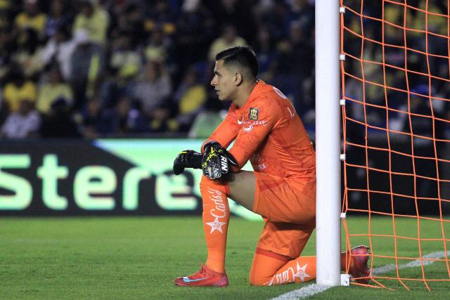 America's goalkeeper #01 Luis Malagon looks on during the Liga MX Clausura tournament quarter-final second leg football match between America and Pachuca at the Sports City Stadium in Mexico City on May 10, 2025. (Photo by Victor Cruz / AFP)