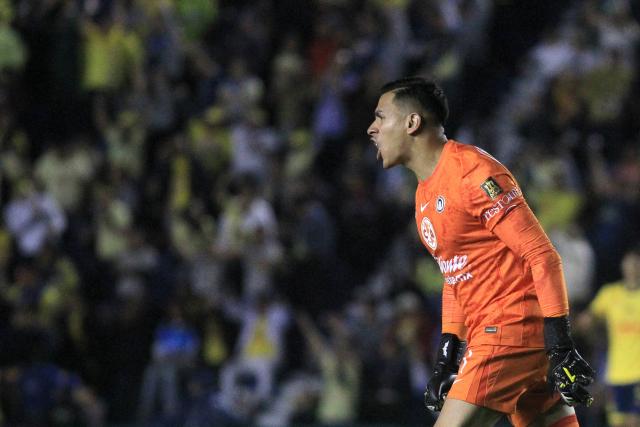 America's goalkeeper #01 Luis Malagon celebrates during the Liga MX Clausura tournament quarter-final second leg football match between America and Pachuca at the Sports City Stadium in Mexico City on May 10, 2025. (Photo by Victor Cruz / AFP)