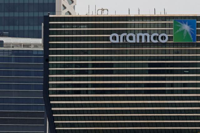 (FILES) This picture shows Aramco tower at the King Abdullah Financial District (KAFD) in Riyadh on April 16, 2023. Oil giant Saudi Aramco on May 11 reported a drop of 4.6 in its first-quarter net profits as lower sales and higher operating costs hit the lynchpin of the kingdom's ambitious economic reform plans. (Photo by Fayez Nureldine / AFP)