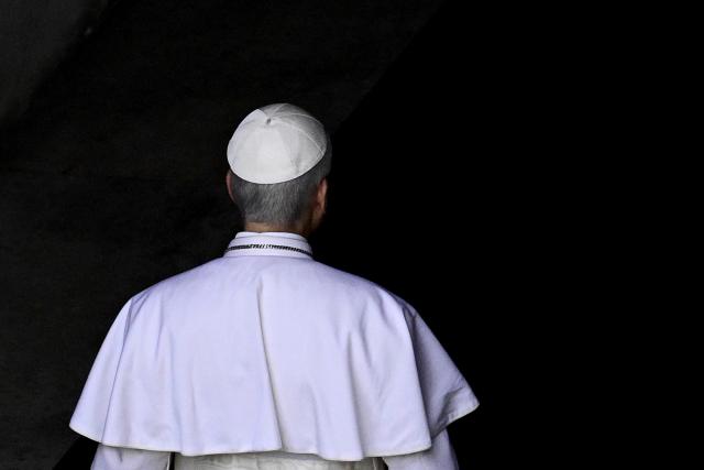 Pope Leo XIV walks in the Vatican before the Regina Caeli prayer, on May 11, 2025. (Photo by Tiziana FABI / AFP)