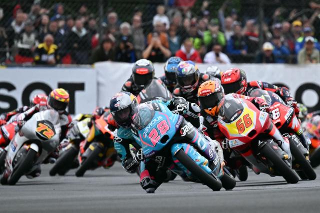 CFMOTO Gaviota Aspar Team's Spanish Moto3 rider Maximo Quiles (C) rides in the France Moto3 race at the Le Mans Circuit on May 11, 2025. (Photo by LOIC VENANCE / AFP)