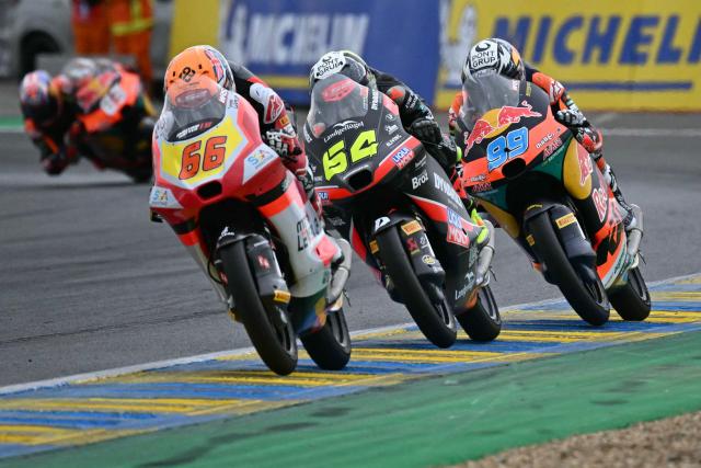 (from L) LEVEL UP - MTA team's Australian Moto3 rider Joel Kelso, second placed, Liqui Moly Dynavolt Intact GP team's Spanish Moto3 rider David Munoz, third placed and Red Bull KTM Tech3 team's Spanish Moto3 rider Jose Antonio Rueda first placed ride in the France Moto3 race at the Le Mans Circuit on May 11, 2025. (Photo by LOIC VENANCE / AFP)