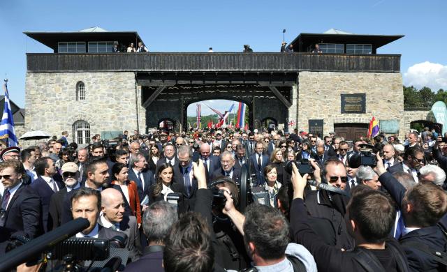 Spain's Queen Letizia, Spain's King Felipe VI, Austria's President Alexander van der Bellen with his wife Doris Schmidauer attend the International Commemoration and Liberation Ceremony at the Memorial of the former concentration camp in Mauthausen, Austria, on May 11, 2025, on the 80th anniversary. (Photo by Hannes DRAXLER / various sources / AFP) / Austria OUT