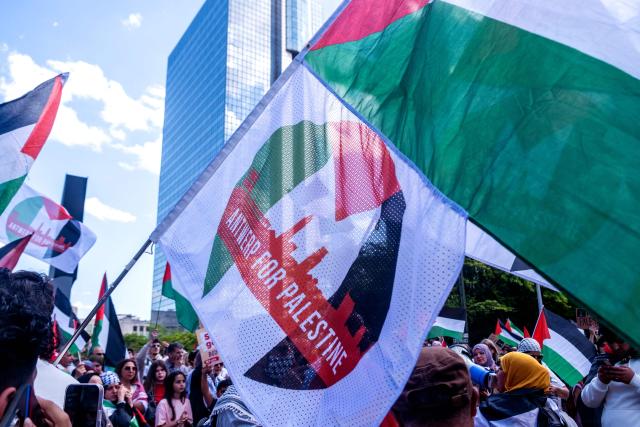 People take part in a protest organised by a coalition of some 60 civil society organisations, to demand a ceasefire in the Palestinian Gaza Strip, in Brussels on May 11, 2025. The war on Gaza erupted after the Palestinian Hamas militant's October 2023 attack on Israel, which resulted in the deaths of 1,218 people, mostly civilians, according to an AFP tally based on official figures. The Gaza health ministry said on may 10, 2025, that at least 2,701 people have been killed since Israel resumed its campaign in Gaza, bringing the overall death toll since the war broke out to 52,810. (Photo by HATIM KAGHAT / Belga / AFP) / Belgium OUT