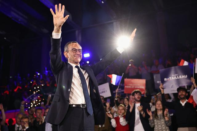 France's Minister of the Interior Bruno Retailleau waves from the stage during his end-of-campaign meeting for the presidency of the French right wing party Les Republicains (LR), in Boulogne-Billancourt, on the outskirts of paris, on May 11, 2025. (Photo by Thomas SAMSON / AFP)