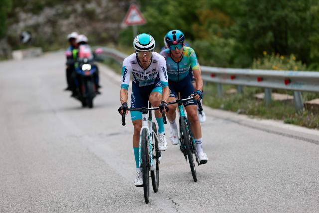 Bahrain Victorious' Spanish rider Pello Bilbao (L) and XDS Astana Team's Italian rider Lorenzo Fortunato (R) ride in a chase group during the 3rd stage of the 108th Giro d'Italia cycling race, 160km from Vlore to Vlore in Albania, on May 11, 2025. (Photo by Luca Bettini / AFP)