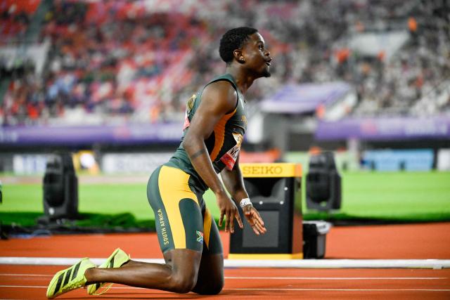 South Africa’s Bradley Nkoana reacts after winning first place in the men’s 4x100m relay final of the World Athletics Relays Guangzhou 25 in Guangzhou, China’s Guangdong province on May 11, 2025. (Photo by WANG Zhao / AFP)