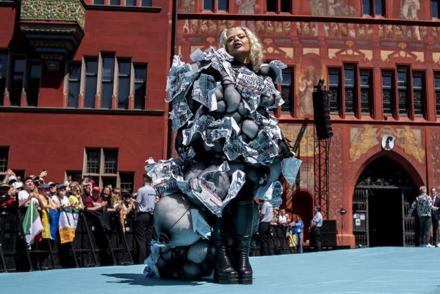 Maltese singer Miriana Conte representing Malta with the song "Serving" poses on the turquoise carpet next to the Basel Town Hall during the opening ceremony of the Eurovision Song Contest 2025 in Basel on May 11, 2025. (Photo by Fabrice COFFRINI / AFP)