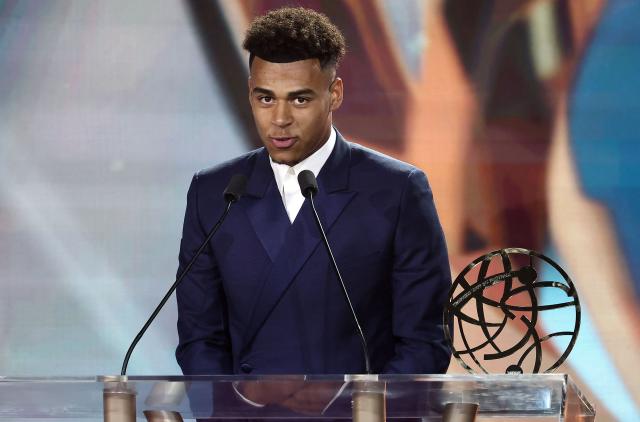 Paris Saint-Germain's French forward #14 Desire Doue delivers a speech after receiving the Best Hopeful player's trophy during the UNFP (French National Professional Football players Union) trophy awards ceremony, in Paris on May 11, 2025. (Photo by FRANCK FIFE / AFP)