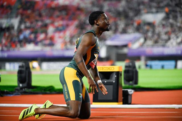 South Africa’s Bradley Nkoana reacts after winning first place in the men’s 4x100m relay final of the World Athletics Relays Guangzhou 25 in Guangzhou, China’s Guangdong province on May 11, 2025. (Photo by WANG Zhao / AFP)