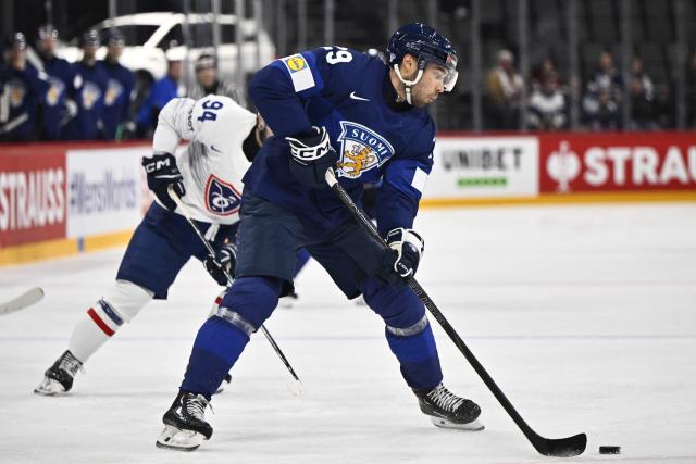 Finland's forward #29 Ahti Oksanen controls the puck during the IIHF Men's Ice Hockey World Championship round 1 group A match between Finland and France at the Avicii Arena in Stockholm, on May 11, 2025. (Photo by Christine OLSSON / various sources / AFP) / Sweden OUT