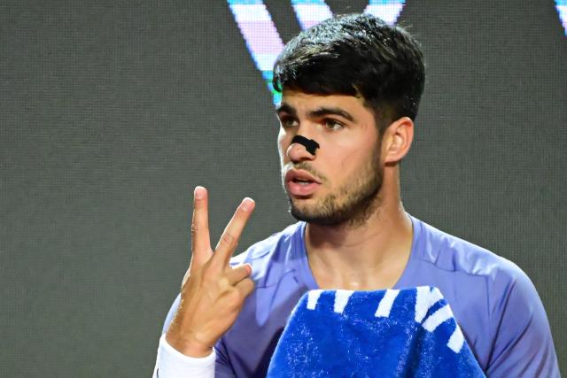 Spain's Carlos Alcaraz gestures during his men's singles match against Serbia's Laslo Djere at the ATP Rome Open tennis tournament at Foro Italico in Rome on May 11, 2025. (Photo by PIERO CRUCIATTI / AFP)
