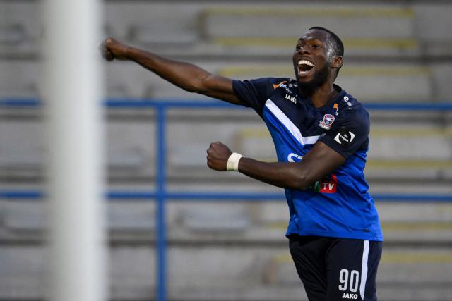 Dender's Belgian forward #90 Mohamed Berte celebrates after scoring a goal during a Belgian Pro League first division football match between FCV Dender EH and OH Leuven, in Denderleeuw on May 11, 2025. (Photo by JOHN THYS / Belga / AFP) / Belgium OUT