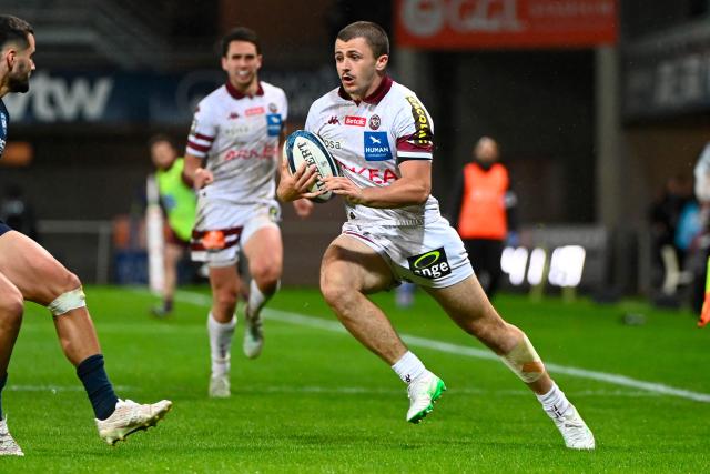 Bordeaux-Begles' French wing Jon Echegaray runs to scores a try during the French Top14 rugby union match between Montpellier Herault Rugby and Bordeaux-Begles (UBB) at the GGL Stadium in Montpellier, southern France on May 11, 2025. (Photo by Sylvain THOMAS / AFP)
