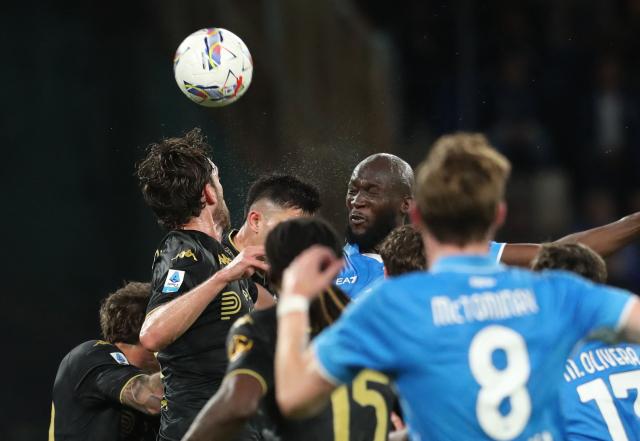 Napoli's Belgian forward #11 Romelu Lukaku heads the ball during the Italian Serie A football match SSC Napoli vs Genoa CFC at Diego Armando Maradona Stadium in Naples, on May 11, 2025. (Photo by CARLO HERMANN / AFP)