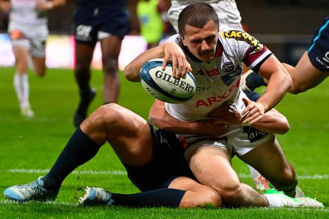 Bordeaux-Begles' French wing Jon Echegaray scores a try during the French Top14 rugby union match between Montpellier Herault Rugby and Bordeaux-Begles (UBB) at the GGL Stadium in Montpellier, southern France on May 11, 2025. (Photo by Sylvain THOMAS / AFP)