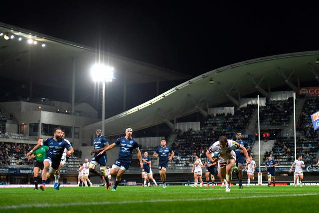 Bordeaux-Begles' French wing Jon Echegaray (R) runs to scores a try during the French Top14 rugby union match between Montpellier Herault Rugby and Bordeaux-Begles (UBB) at the GGL Stadium in Montpellier, southern France on May 11, 2025. (Photo by Sylvain THOMAS / AFP)