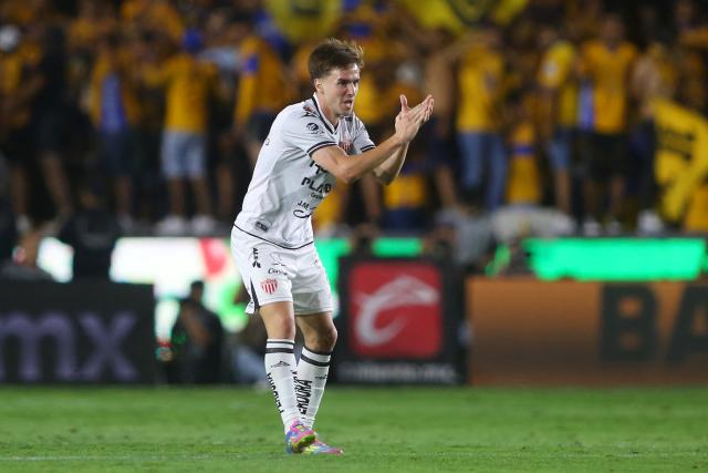 Necaxa's midfielder #08 Agustin Palavecino celebrates after scoring his team's first goal during the Liga MX Clausura tournament quarter-final second leg football match between Tigres and Necaxa at the UANL University Stadium in San Nicolás de los Garza, Nuevo Leon state, Mexico on May 11, 2025. (Photo by Julio Cesar AGUILAR / AFP)