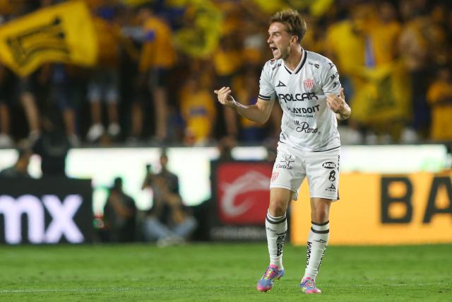 Necaxa's midfielder #08 Agustin Palavecino celebrates after scoring his team's first goal during the Liga MX Clausura tournament quarter-final second leg football match between Tigres and Necaxa at the UANL University Stadium in San Nicolás de los Garza, Nuevo Leon state, Mexico on May 11, 2025. (Photo by Julio Cesar AGUILAR / AFP)