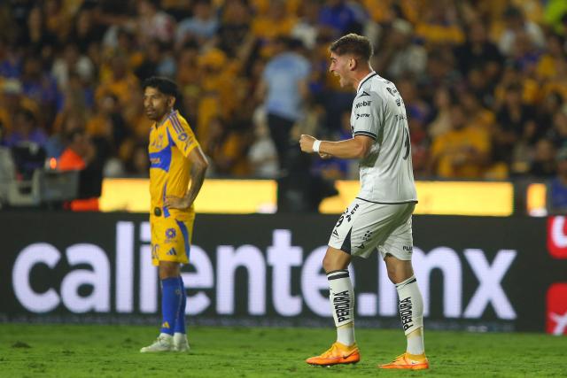 Necaxa's forward #09 Tomas Badaloni celebrates after scoring his team's second goal during the Liga MX Clausura tournament quarter-final second leg football match between Tigres and Necaxa at the UANL University Stadium in San Nicolás de los Garza, Nuevo Leon state, Mexico on May 11, 2025. (Photo by Julio Cesar AGUILAR / AFP)