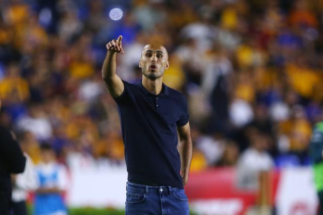 Tigres' Argentine coach Guido Pizarro gestures during the Liga MX Clausura tournament quarter-final second leg football match between Tigres and Necaxa at the UANL University Stadium in San Nicolás de los Garza, Nuevo Leon state, Mexico on May 11, 2025. (Photo by Julio Cesar AGUILAR / AFP)