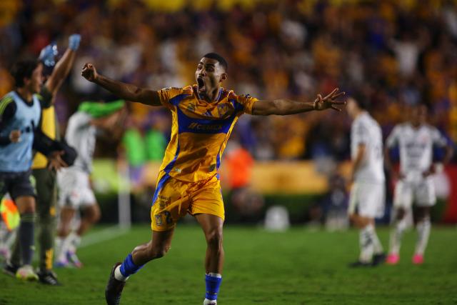 Tigres' Brazilian defender #02 Joaquim Henrique celebrates after an own goal by Necaxa's defender #05 Alejandro Mayorga (out of frame) during the Liga MX Clausura tournament quarter-final second leg football match between Tigres and Necaxa at the UANL University Stadium in San Nicolás de los Garza, Nuevo Leon state, Mexico on May 11, 2025. (Photo by Julio Cesar AGUILAR / AFP)