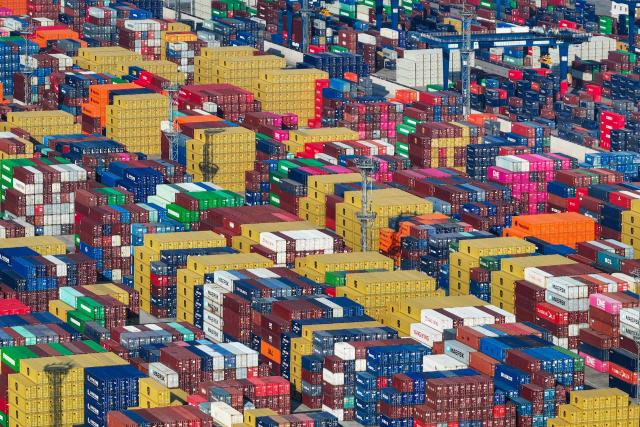 Containers are stacked at a port in Nanjing, in eastern China's Jiangsu province on May 12, 2025. (Photo by AFP) / China OUT