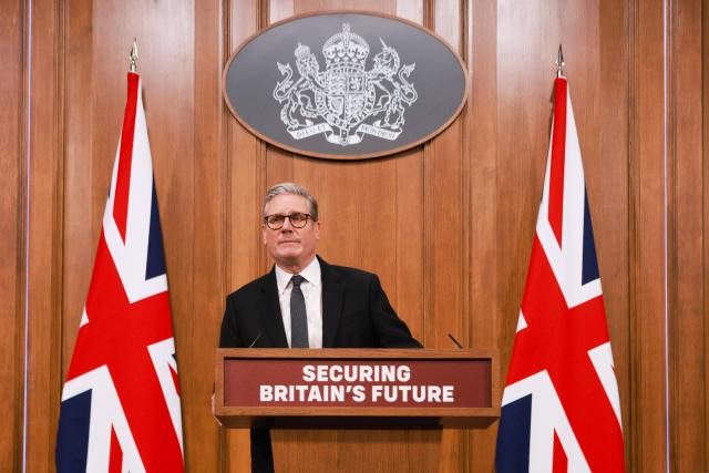 Britain's Prime Minister Keir Starmer delivers a speech during a press conference at the media briefing room of 9 Downing Street, central London, on May 12, 2025 ahead of the publication of the Government’s Immigration White Paper. Prime Minister Keir Starmer vowed on May 12 to "finally take back control" of Britain's borders as his government unveiled policies designed to reduce immigration and fend off rising support for the hard right. (Photo by Ian Vogler / POOL / AFP)