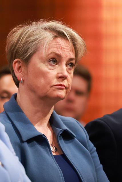 Britain's Home Secretary Yvette Cooper reacts during Britain's Prime Minister press conference at the media briefing room of 9 Downing Street, central London, on May 12, 2025 ahead of the publication of the Government’s Immigration White Paper. Prime Minister Keir Starmer vowed on May 12 to "finally take back control" of Britain's borders as his government unveiled policies designed to reduce immigration and fend off rising support for the hard right. (Photo by Ian Vogler / POOL / AFP)
