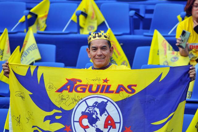 An America fan poses for a picture before the Liga MX Women's final second-leg football match between America and Pachuca at the Ciudad de los Deportes Stadium in Mexico City on May 12, 2025. (Photo by Victor Cruz / AFP)