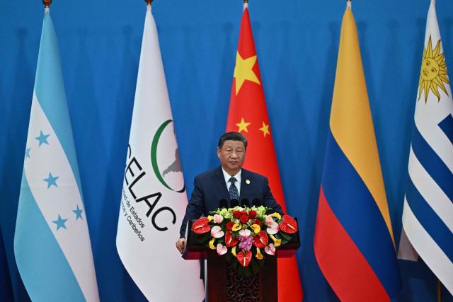 China’s President Xi Jinping speaks during the opening ceremony of the Fourth Ministerial Meeting of the Forum of China and Community of Latin American and Caribbean States (CELAC), in Beijing on May 13, 2025. (Photo by Pedro Pardo / AFP)