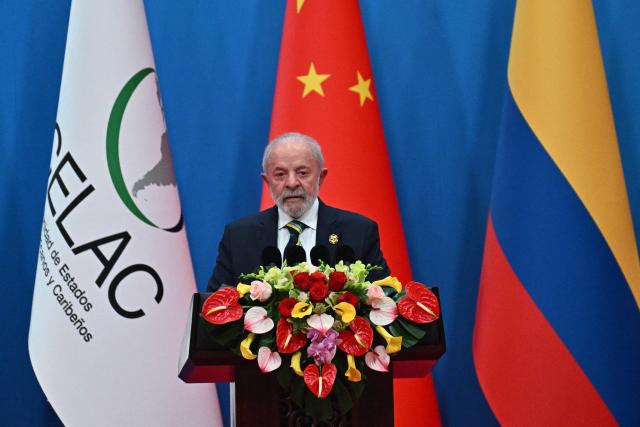 Brazil’s President Luiz Inacio Lula da Silva attends the opening ceremony of the Fourth Ministerial Meeting of the Forum of China and Community of Latin American and Caribbean States (CELAC) in Beijing on May 13, 2025. (Photo by Pedro Pardo / AFP)