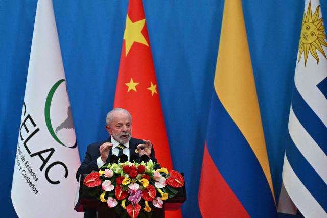 Brazil’s President Luiz Inacio Lula da Silva attends the opening ceremony of the Fourth Ministerial Meeting of the Forum of China and Community of Latin American and Caribbean States (CELAC) in Beijing on May 13, 2025. (Photo by Pedro Pardo / AFP)