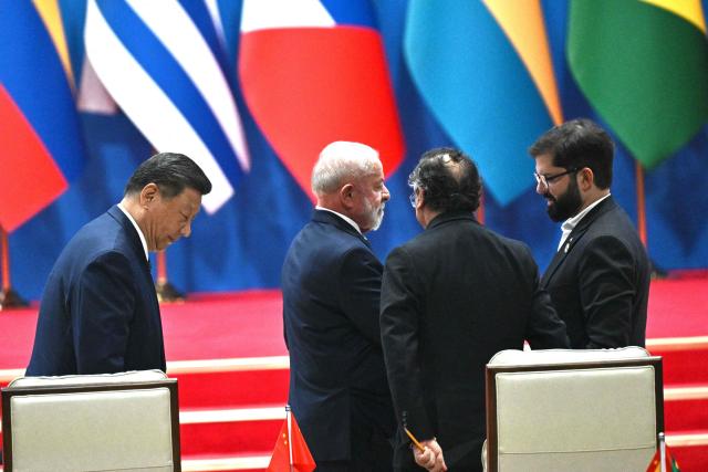 (L-R) China’s President Xi Jinping, Brazil’s President Luiz Inacio Lula da Silva, Colombia’s President Gustavo Petro and Chile’s President Gabriel Boric attend the opening ceremony of the Fourth Ministerial Meeting of the Forum of China and Community of Latin American and Caribbean States (CELAC) in Beijing on May 13, 2025. (Photo by Pedro Pardo / AFP)
