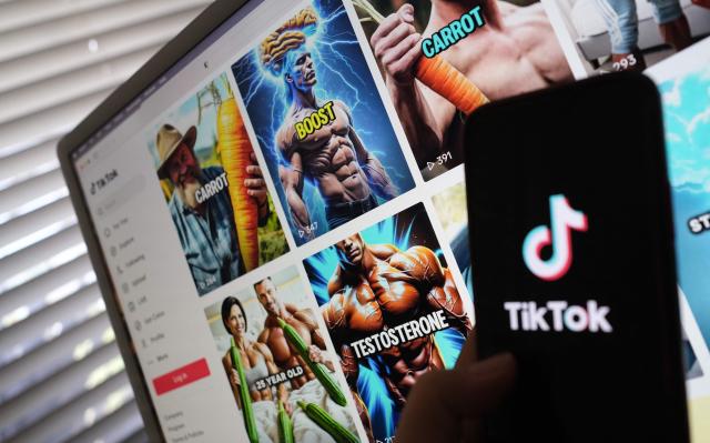 This illustration photo shows the TikTok logo on a smartphone in front of a screen showing images from a TikTok account promoting daily supplements in Los Angeles, May 2, 2025. Holding an oversized carrot, a brawny, shirtless man promotes a supplement he dubiously claims can enlarge male genitalia -- one of countless AI-generated videos on TikTok peddling unproven treatments. (Photo by Chris DELMAS / AFP)