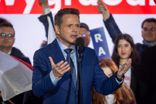 Warsaw's mayor and member of Poland’s ruling Civic Coalition party Rafal Trzaskowski speaks to his supporters after the presidential debate in Polish National Television headquarters in Warsaw on May 12, 2025. Poland will hold presidential election on May 18, 2025. (Photo by Wojtek RADWANSKI / AFP)