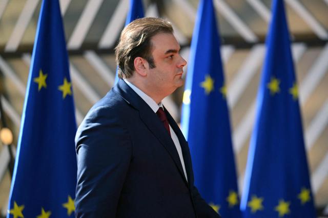 Greek Finance Minister Kyriakos Pierrakakis arrives for a European Union (EU) Economic and Financial Affairs Council (ECOFIN) at the European Council headquarters in Brussels on May 13, 2025. (Photo by NICOLAS TUCAT / AFP)