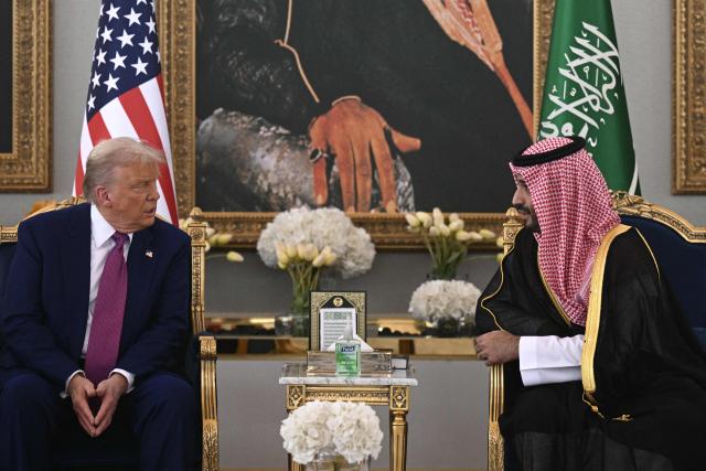 Saudi Crown Prince Mohammed bin Salman (R) meets with US President Donald Trump in Riyadh on May 13, 2025. (Photo by Brendan SMIALOWSKI / AFP)